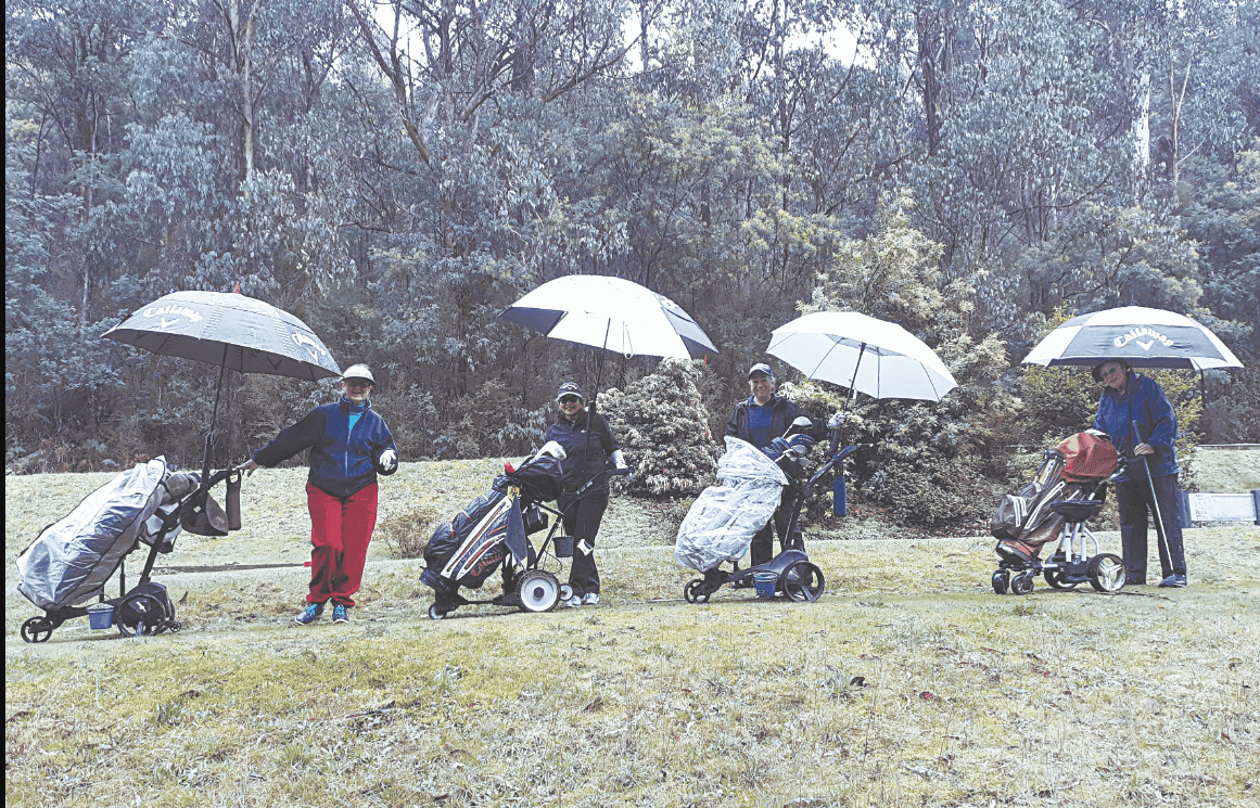 Golfing in the rain at Marysville