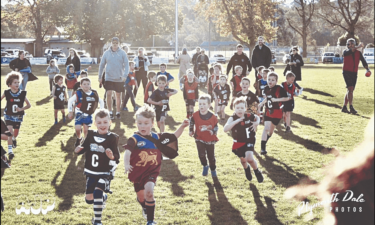 Auskickers take to the half time ground